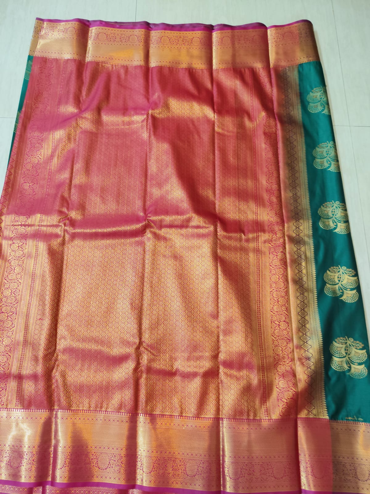 Emerald Green Kanchipuram Semi Silk Saree with Gold Zari Peacock Buttas